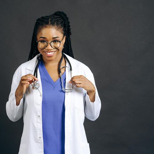 Portrait of a smiling, confident woman, an experienced practitioner.